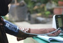 심혈관 질환 예방을 위한 생활습관 개선 woman in brown and white leopard print bikini bottom holding blue and white plastic bottle