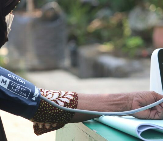 심혈관 질환 예방을 위한 생활습관 개선 woman in brown and white leopard print bikini bottom holding blue and white plastic bottle