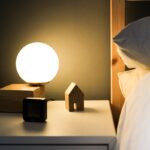 black digital alarm clock at 11 00