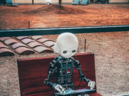 AI 기반 건강 관리, 일상 속 똑똑하게 실천하는 법 black and white robot toy on red wooden table